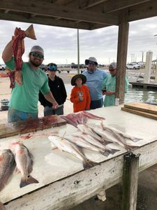 5 people fishing at Aransas Pass, with 3 fish caught