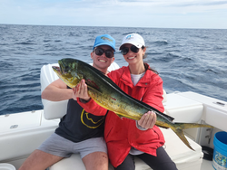Two people fishing in Florida with cruises and fishing