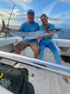 Couple enjoying a fishing cruise in Florida