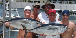 Two yellowtail amberjack and yellowfin tuna fish caught in FL on cruises and fishing trip