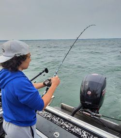 Steady fight! Lake Michigan salmon on the line.
