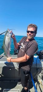 Angler proudly displaying their catch in Michigan