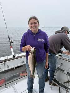 A 16-inch rainbow trout reeled in on a light tackle fishing trip.