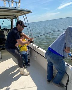 Two people enjoying a cruises and fishing trip in MD