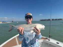 Reeling in a redfish with a perfect view!