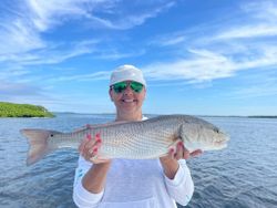 Redfish measuring 28 inches caught while fishing in Cape Coral