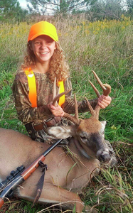 Successful white-tailed deer harvest in Tampa FL under partly cloudy skies.