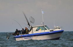 Two people enjoying fishing in Traverse City