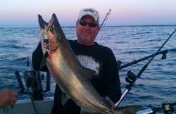 A lone angler fishing in Traverse City