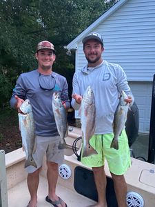 Redfish, Spotted Weakfish, and 2 people fishing in Beaufort
