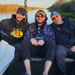 Three people enjoying a fishing tour in Fort Lauderdale