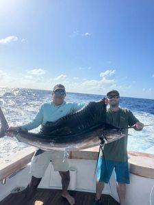 Two people enjoying a fishing tour in Fort Lauderdale