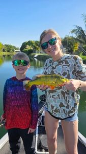 Peacock bass catch during fishing tour in Fort Lauderdale FL