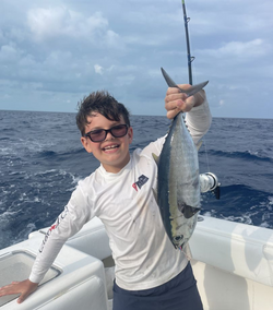 A lone angler reels in a 13-inch catch in the waters of Islamorada