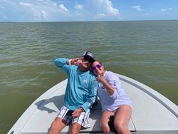 Two people fishing in Port Isabel