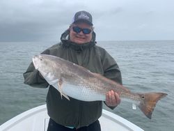 One person fishing in Port Isabel