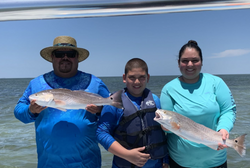 Two redfish caught during a fishing trip at Port Isabel