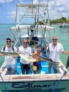 Five people fishing near Dominicus