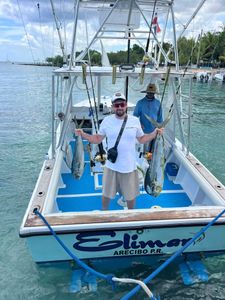Two anglers fishing in Dominicus