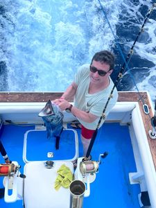 One fisherman catching a 10-inch fish in Dominicus