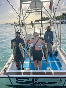 Two people fishing in Dominicus