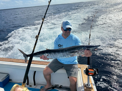 Angler with a large 33-inch fish in Dominicus