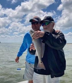 Two anglers fishing in TX