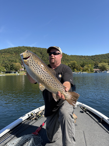 Nice sea trout using light tackle jigging in clear conditions!