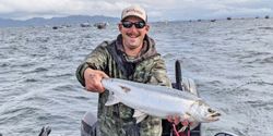 Anglers fishing in Oregon with a big 22-inch catch