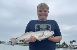 Smiling with a solid Redfish!