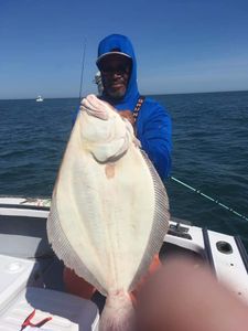 Lone angler fishing in MA