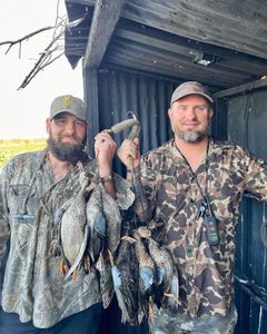 Two people enjoying a fishing and hunting trip in LA