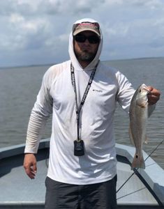 Adventurous angler poses with 14-inch catch in Marksville