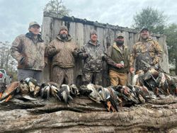 5 people enjoying fishing and hunting in Marksville