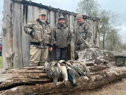 Three people enjoying fishing and hunting in Marksville