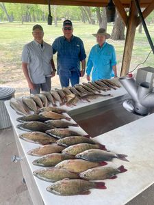 Two anglers fishing in SD with big fish