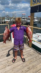 Angler fishing in Florida with 2 fish