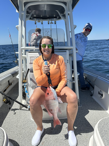 A mighty Red Snapper reeled in under clear skies!