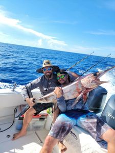 A couple buddies and there 1st swordfish