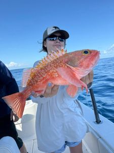 Angler with a big fish at Lake Worth