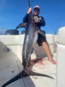 A single angler fishing at Lake Worth