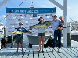 4 people fishing with 2 big fish in FL