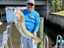 A lone angler with a big 21-inch fish in Florida