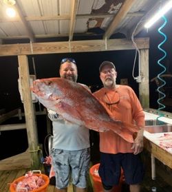 Two anglers on a fishing cruise in Dauphin Island