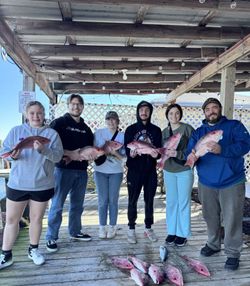 Six people enjoying a cruises and fishing trip on Dauphin Island