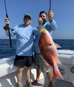 A couple enjoy a cruises fishing adventure in AL