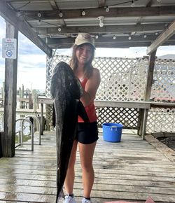 Angler enjoying a day of cruises and fishing at Dauphin Island