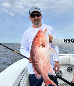 Angler enjoying a fishing trip in AL