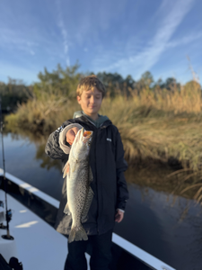 Nice speckled trout on light tackle! Clear skies made for perfect fishing conditions.