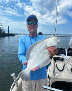 Angler with a 19-inch fish in New Jersey